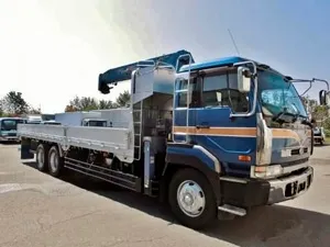 фото манипулятора Nissan с КМУ